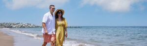 Couple enjoying the beach on the last weekend before school at Address Hotels + Resorts